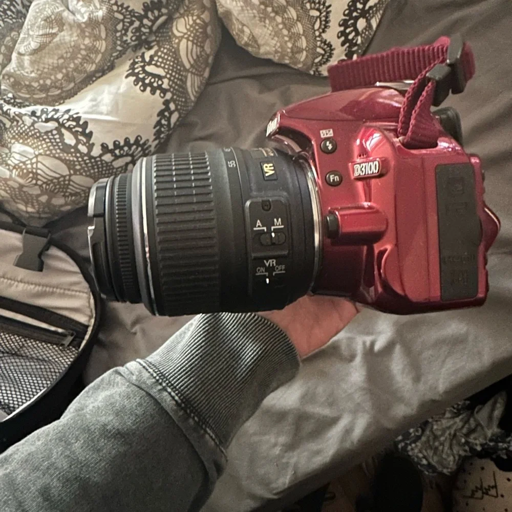 Nikon D3100 with bag, battery, etc